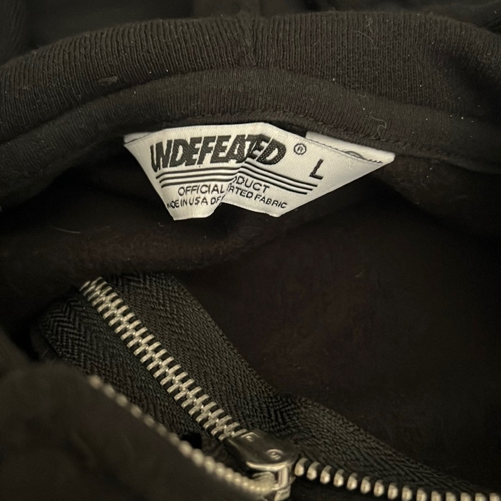 Undefeated zip up hoodie